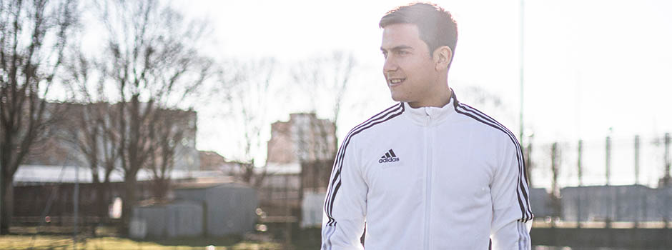 Paulo Dybala close shot in white Adidas jacket, happy to join team Skrill
